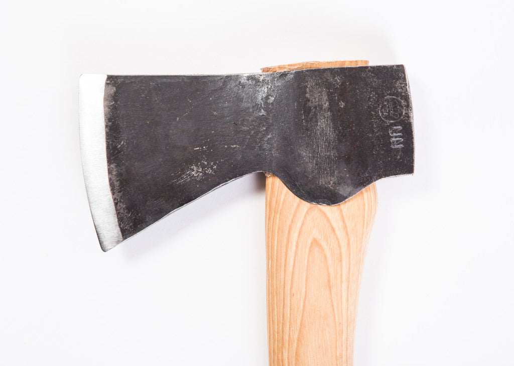 Wooden-handled axe with a metal head on a white background
