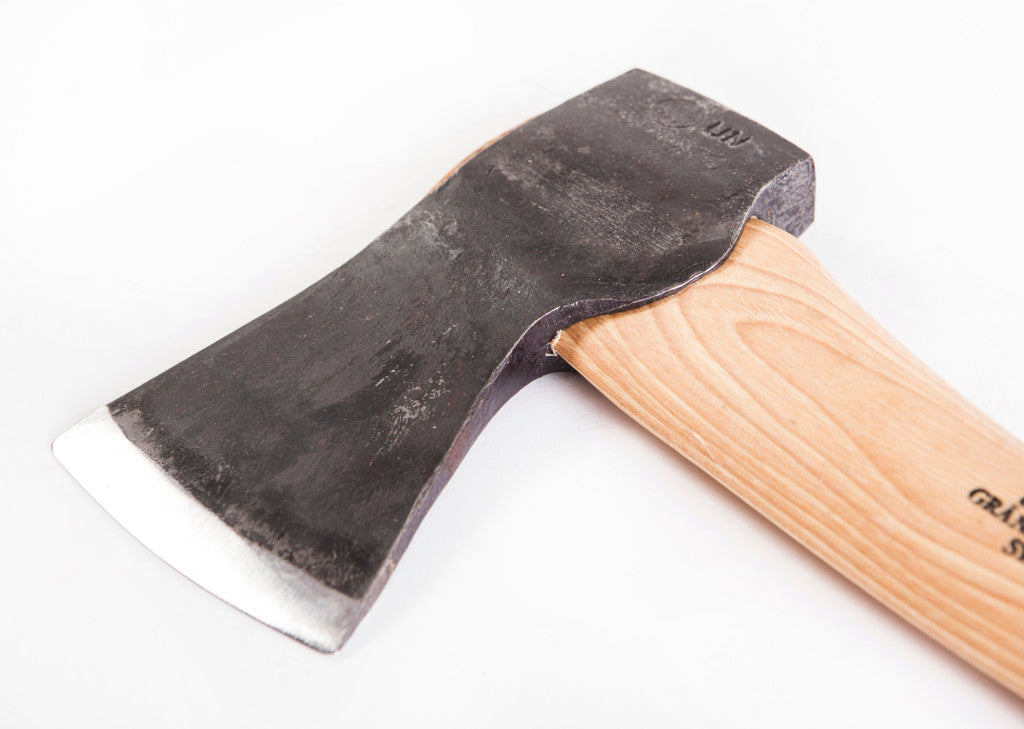 Wooden-handled axe on a white background