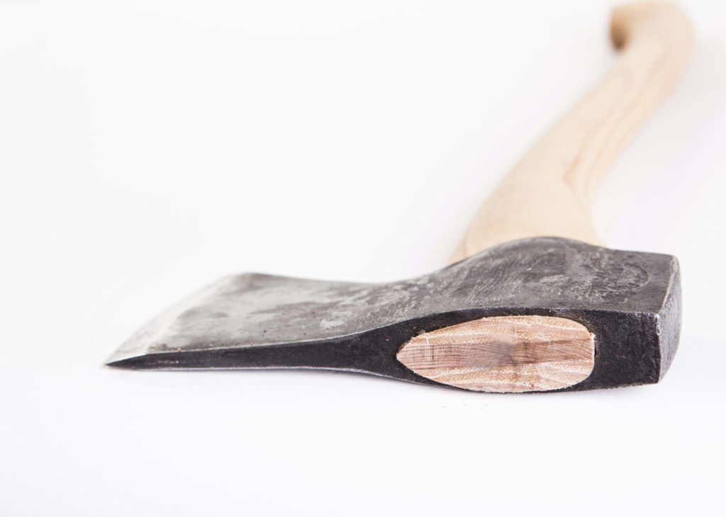 Wooden-handled axe on a white background