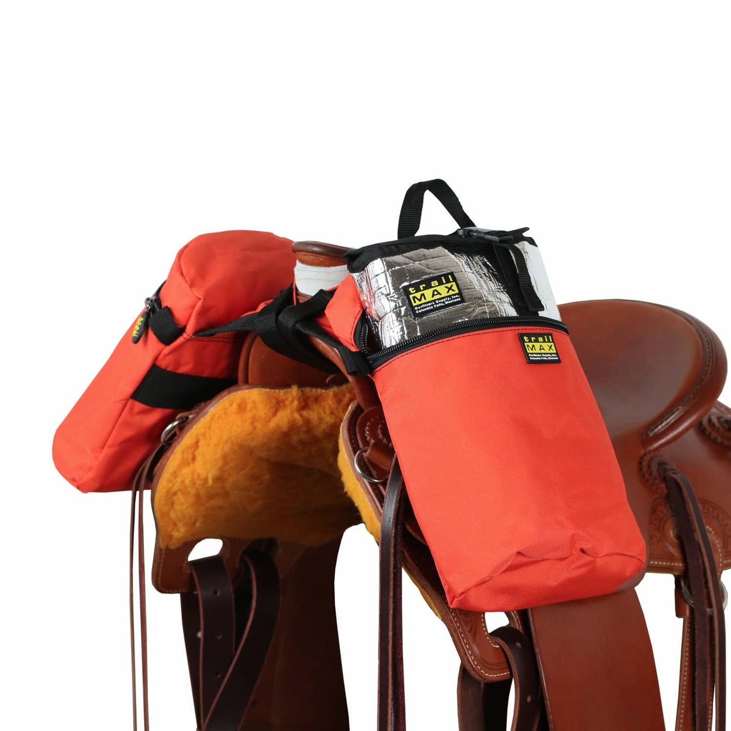 A set of orange TrailMax horn saddle bags attached to a saddle horn, featuring a pair of insulated liners.
