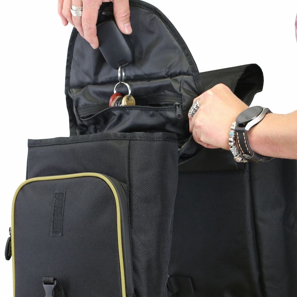 Set of 500 Series Back Pocket Saddlebags  shown with flap open and a person putting keys in pocket