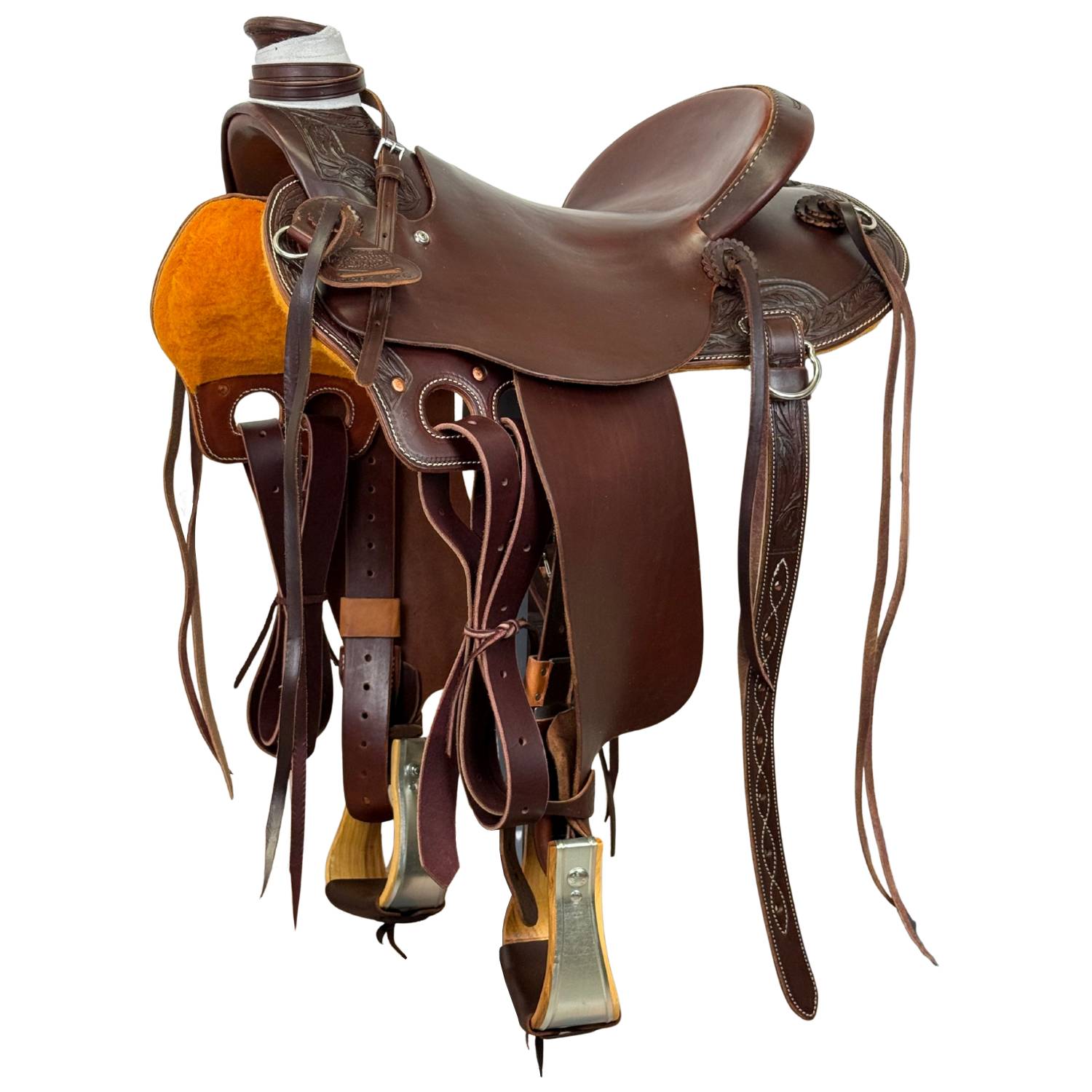A dark brown leather western saddle with attached stirrups,  on a white background.
